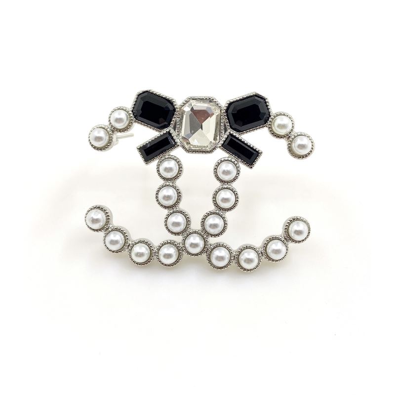Ch*el brooches